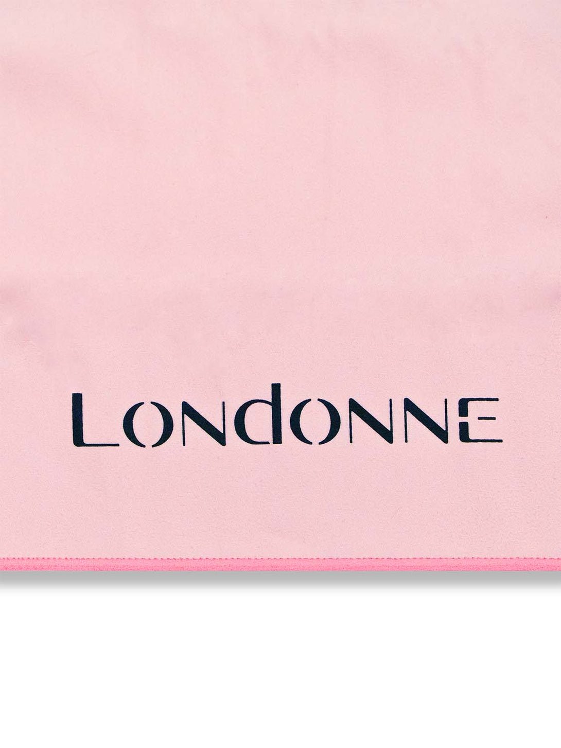 Close up logo view of Londonne pink microfiber mini sweat towel for dancers 