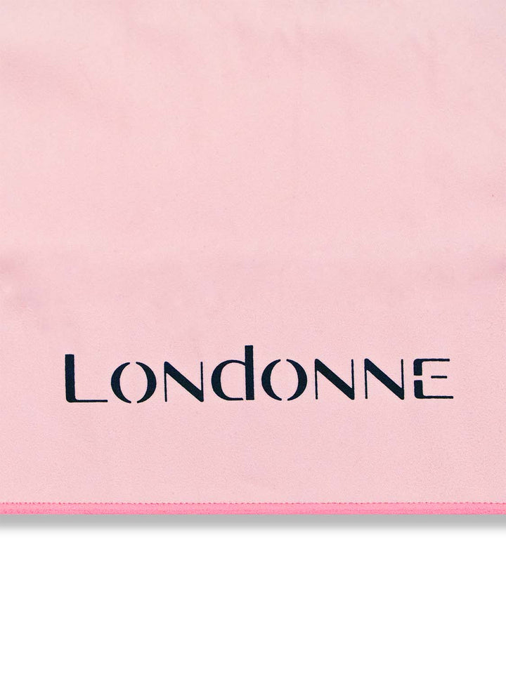 Close up logo view of Londonne pink microfiber mini sweat towel for dancers 
