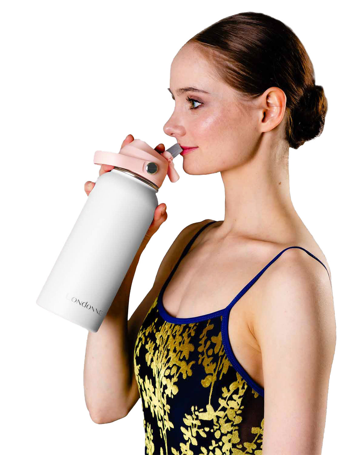 Dancer drinking from a white stainless steel water bottle Londonne